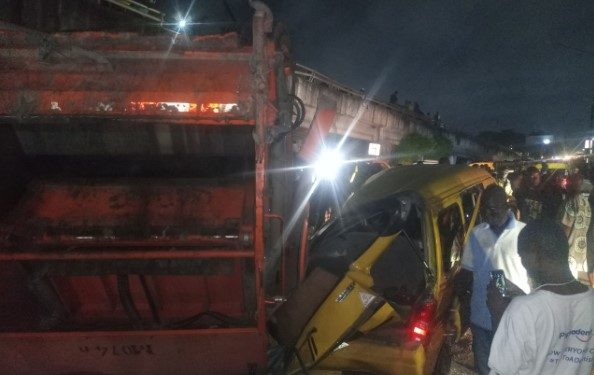 A tragic incident occurred in Lagos State on March 7 2024, when a tricycle rider lost his life after a refuse compactor fell from a bridge in the Surulere area. The incident took place in the evening and involved a truck owned by the Lagos Waste Management Authority. According to reports, the truck was crossing the Shitta bridge when it experienced a mechanical fault while in motion, causing the driver to lose control. As a result, the truck collided with a Kia Saloon car on the bridge. The impact of the crash caused the compactor to detach from the truck and fall down the side of the bridge onto a mini commercial bus and a tricycle. The tricycle rider, whose identity is yet to be determined, tragically died on the spot. The Lagos State Emergency Management Agency (LASEMA) confirmed the incident and stated that they received a distress call late in the evening. The emergency response teams quickly arrived at the scene and worked to recover the remains of the deceased. The LASEMA Permanent Secretary, Olufemi Oke-Osanyintolu, provided additional details, explaining that the compactor truck had suffered a mechanical error, resulting in the loss of control. The crash caused significant damage to the vehicles involved and led to the unfortunate loss of life. The LASEMA response team, along with other agencies such as LASAMBUS, LASTMA, and the police, were present at the scene to manage the situation. The vehicles were eventually moved to the Iponri Police Station for further investigation. It is important to respect the privacy of the deceased and their family during this difficult time. Our thoughts are with all those affected by this tragic accident.