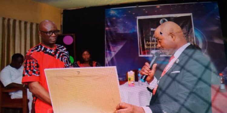 Comrade Leo Atakpu Presented with Outstanding Activist of the Year Award