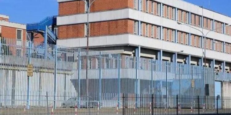 Ivrea Prison Unrest: Officers Injured, Inmate Protests from Rooftop