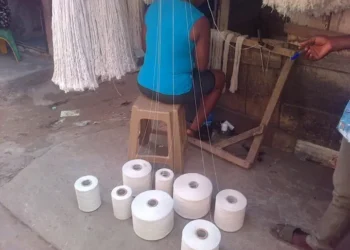 Nigerians Get Creative with Stove Thread, 'Pure' Water Sachets to Design Clothes