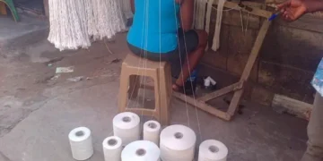 Nigerians Get Creative with Stove Thread, 'Pure' Water Sachets to Design Clothes